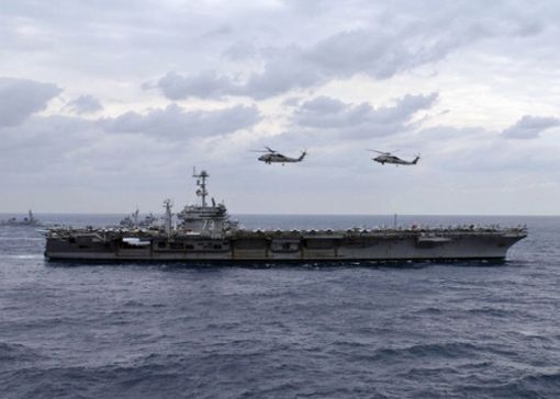 資料圖：美軍“喬治·華盛頓”號(hào)航空母艦與反潛機(jī)編隊(duì)。