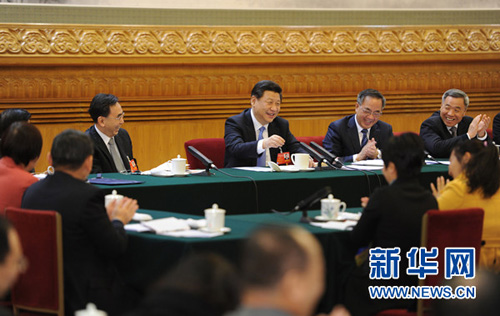 3月6日，中共中央總書記、國家主席、中央軍委主席習(xí)近平參加十二屆全國人大二次會(huì)議廣東代表團(tuán)的審議。 新華社記者謝環(huán)馳攝